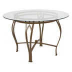 Mesa de comedor redonda de cristal con estructura metálica curvada