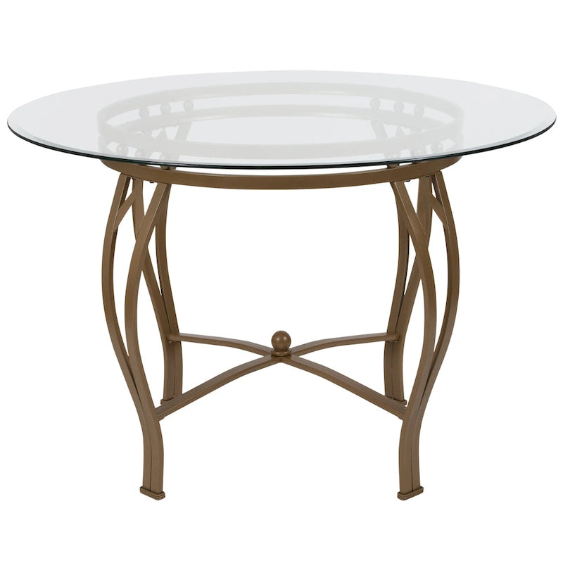 Mesa de comedor redonda de cristal con estructura metálica curvada