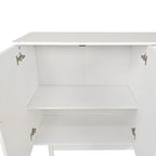 Armario de almacenamiento blanco de 4 puertas con paneles de talla, MDF y patas de pino