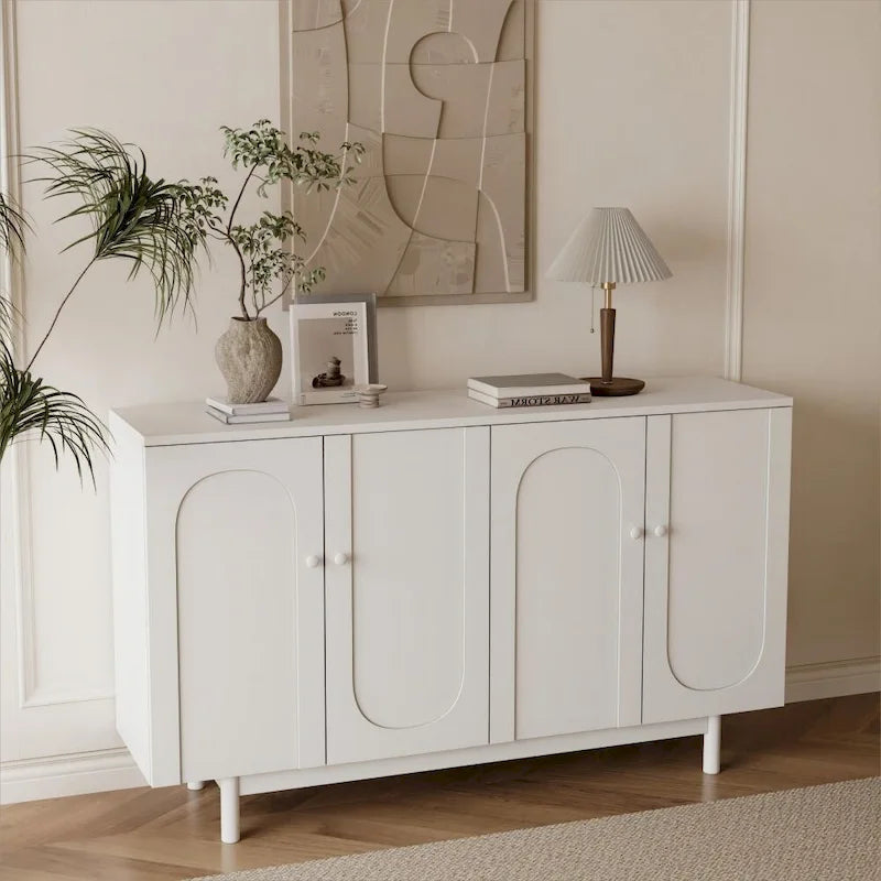 Armario de almacenamiento blanco de 4 puertas con paneles de talla, MDF y patas de pino